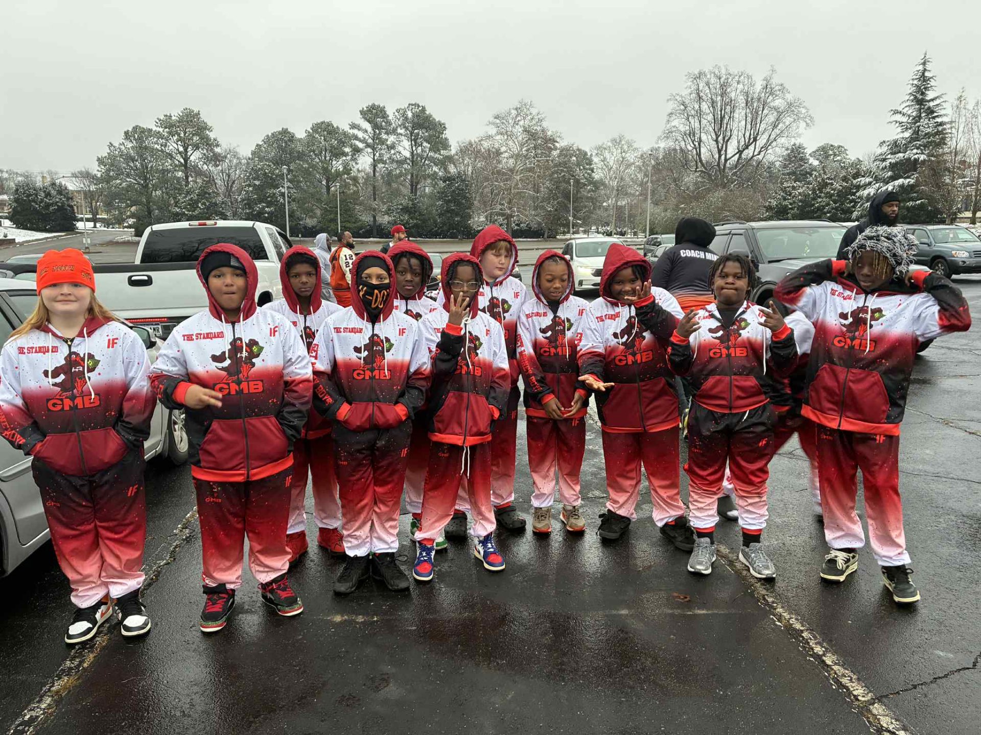 The Standard GMB — Full roster hooded tracksuits, team on gameday